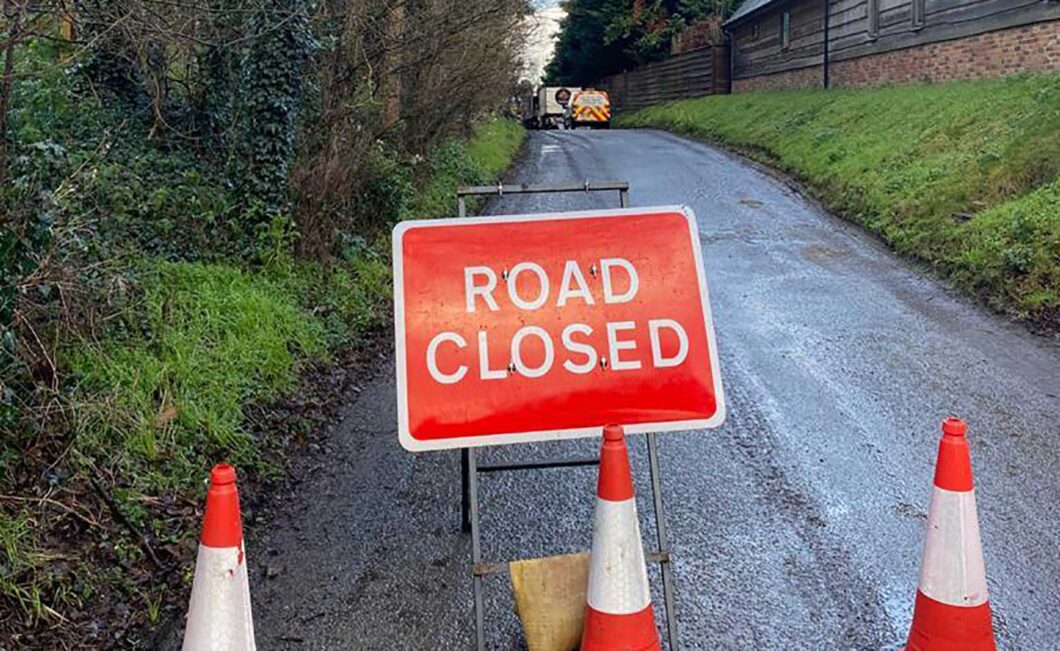 A road closed sign placed by oxford tree surgeons